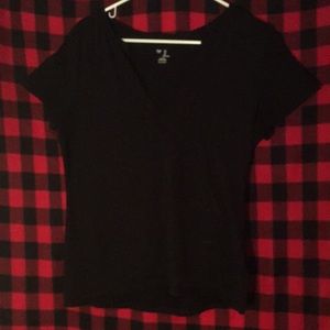 A black gap t-shirt  cut into a deep v-neck